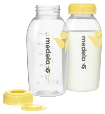 Medela – dwie butelki 250 ml i rozłożona żółta nakrętka