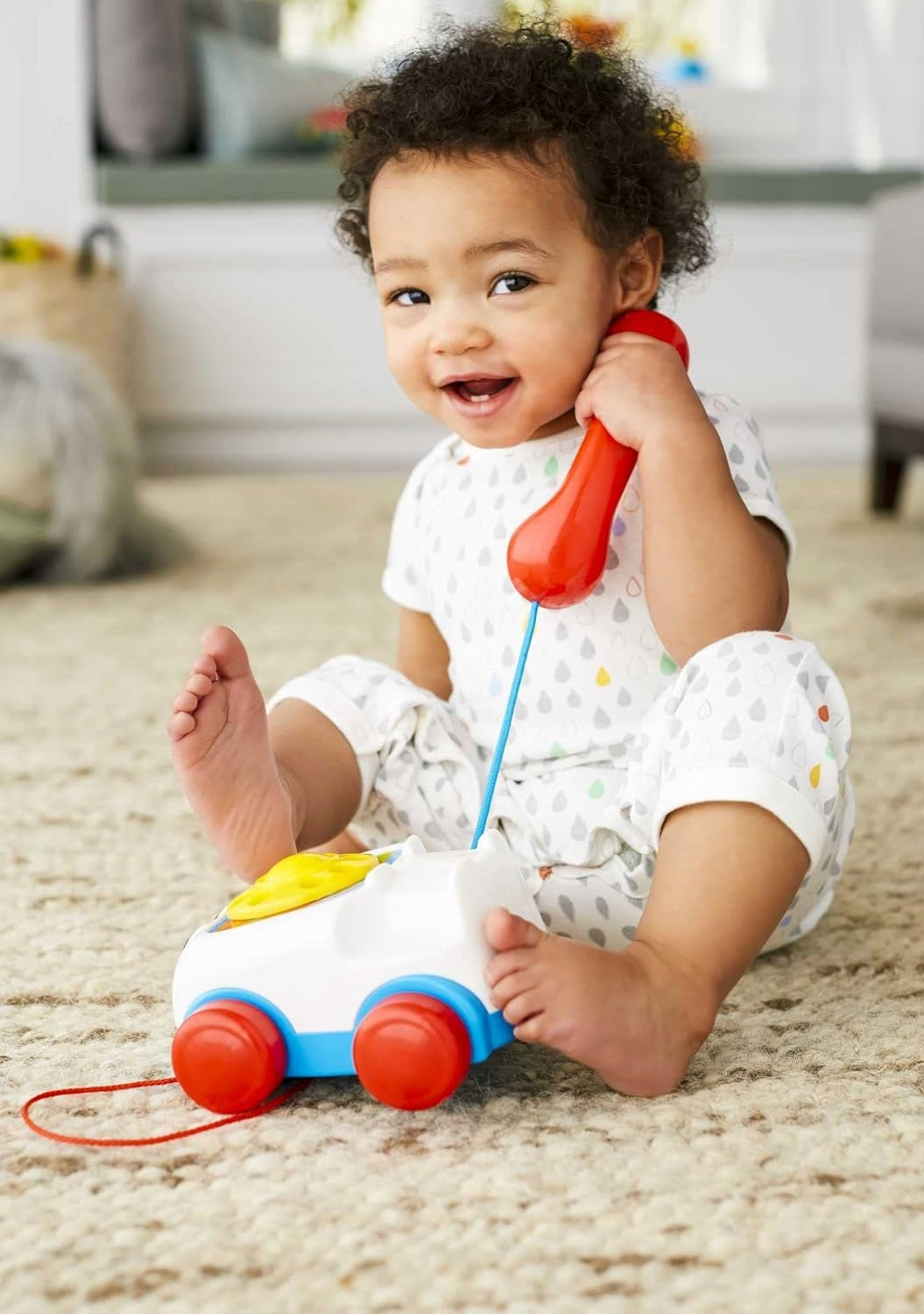 FISHER-PRICE telephone with a dial to turn and a string to pull