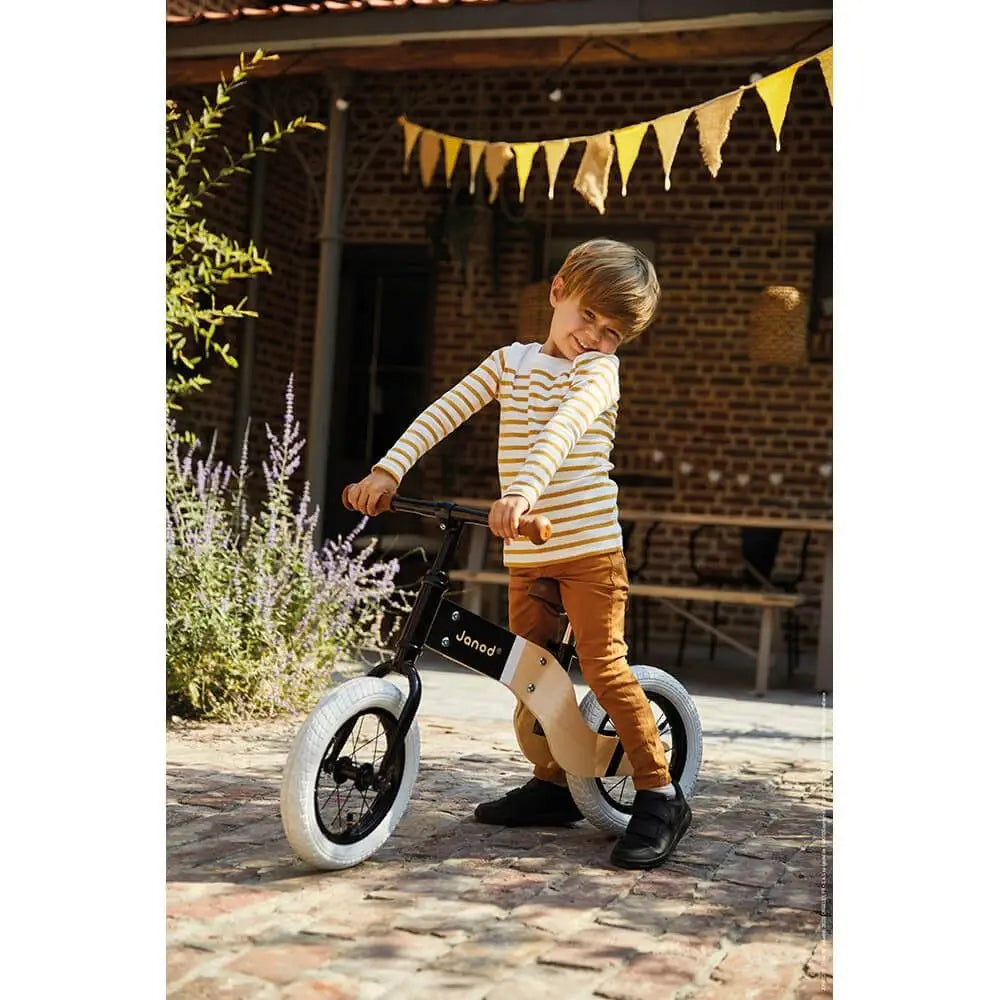 JANOD Bikloon Deluxe drewniany rowerek biegowy 12" siodełko 40-46 cm dla dziecka, czarno-brązowo-biały
